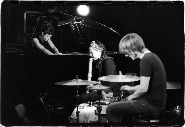 Sakina Abdou, Barbara Dang, and Peter Orins performing